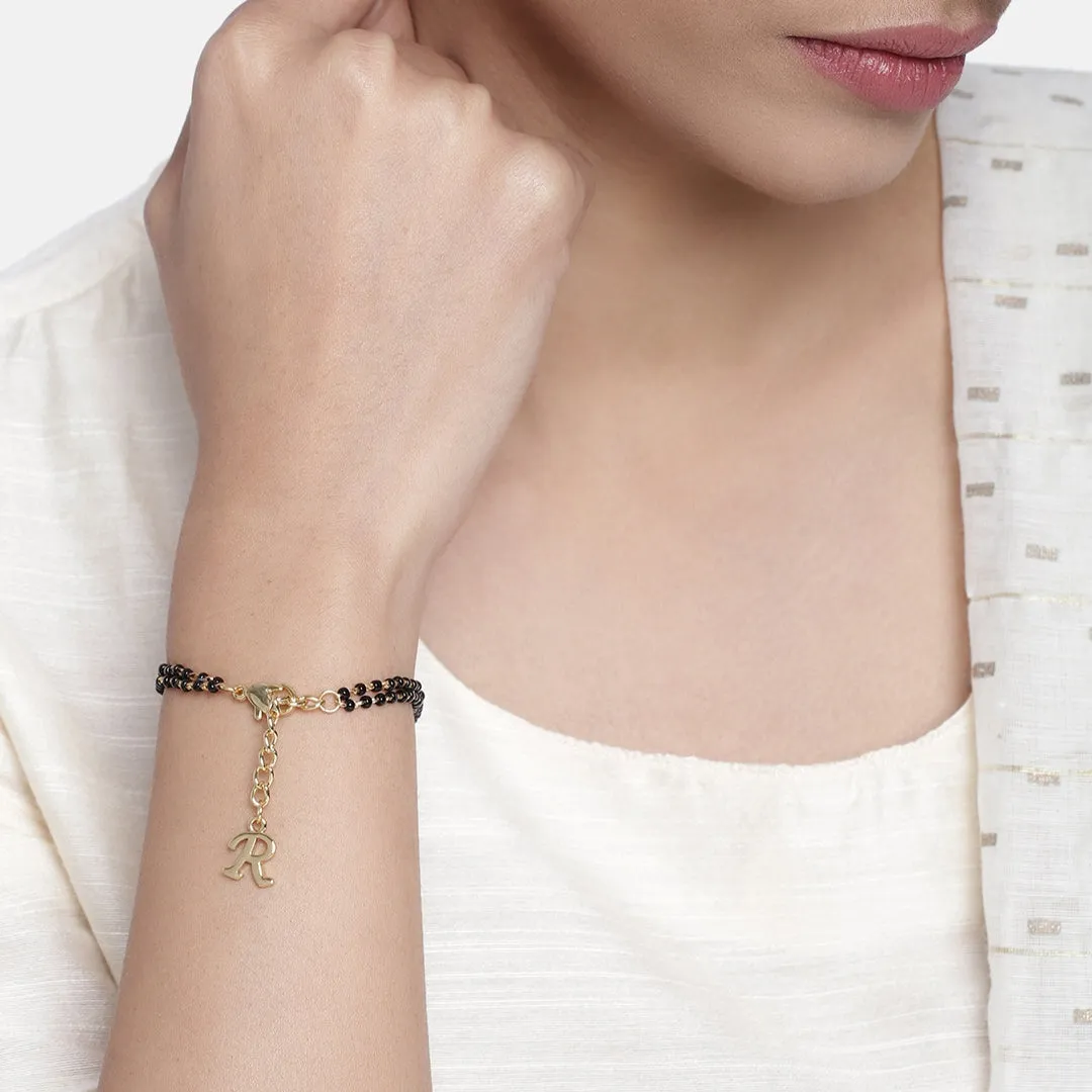Estele Gold Plated Stylish Personalized "R" Letter Mangalsutra Charm Bracelet with Black Beads for Women