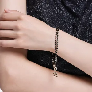 Estele Gold Plated Stylish Personalized "R" Letter Mangalsutra Charm Bracelet with Black Beads for Women