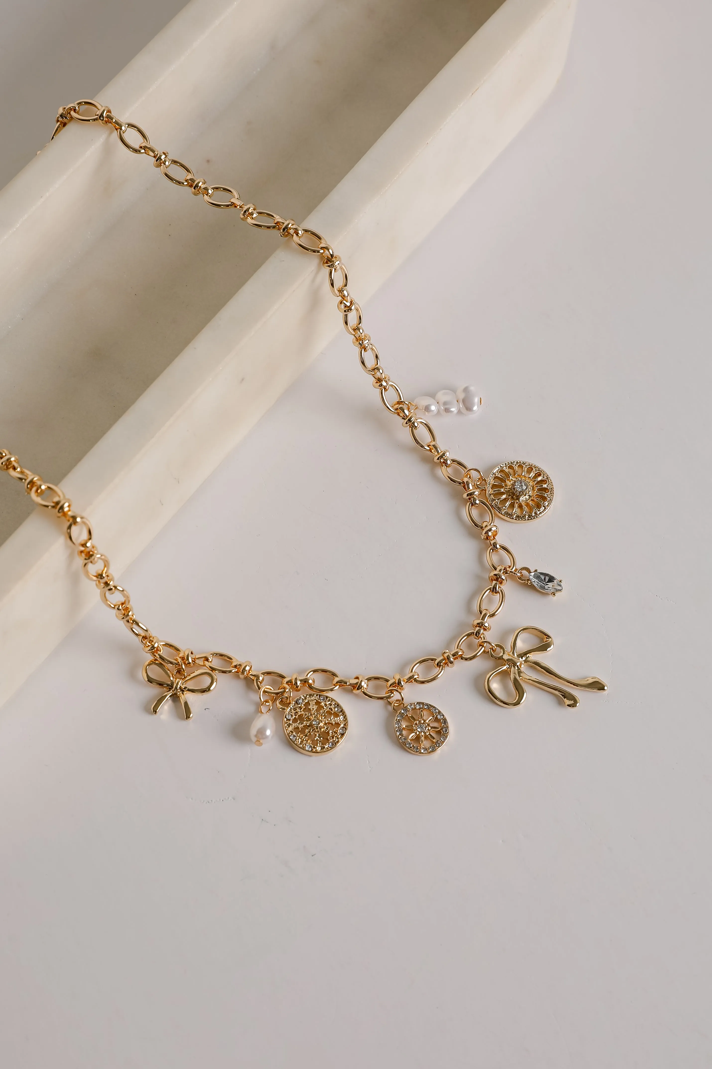 Meredith Gold Bow Charm Necklace