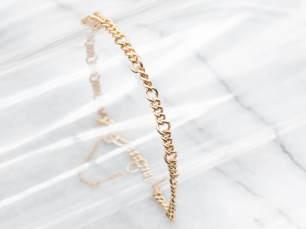 Polished Gold Curb and Round Link Charm Bracelet